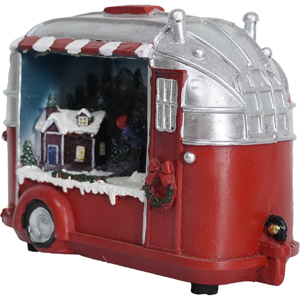 Kristmar Caravan met ronddraaiende schaatser, muziek en LED verlichting