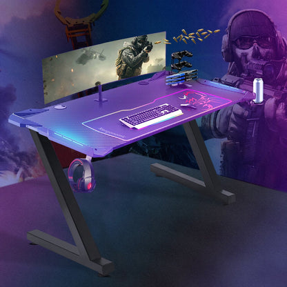 Tweedekans Xergonomic Aurora Gaming Desk - Carbonfiber look - Computer Tafel - LED-Verlichting - Incl. beker-, koptelefoonhouder en kabelorganizer - 62 x 160 x 75 cm - Zwart